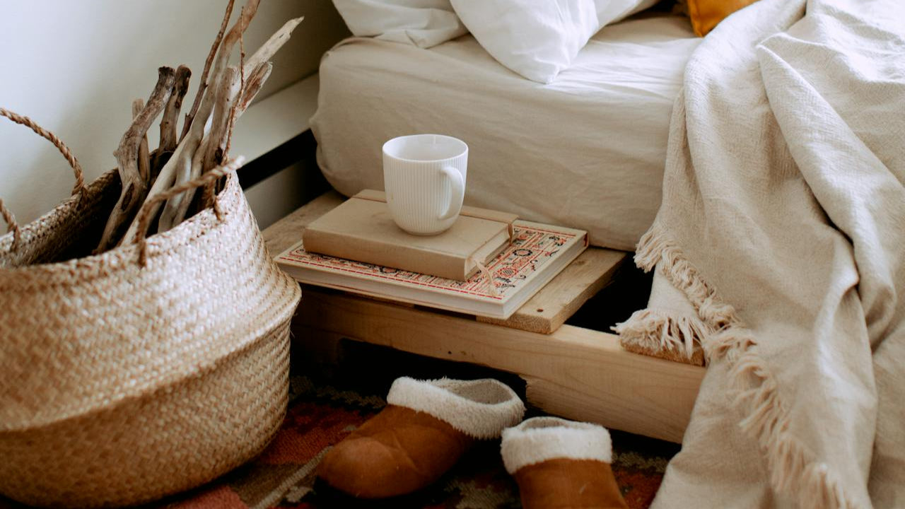 Cosy, tidy home with bed, slippers and mug on Northern Beaches in Sydney